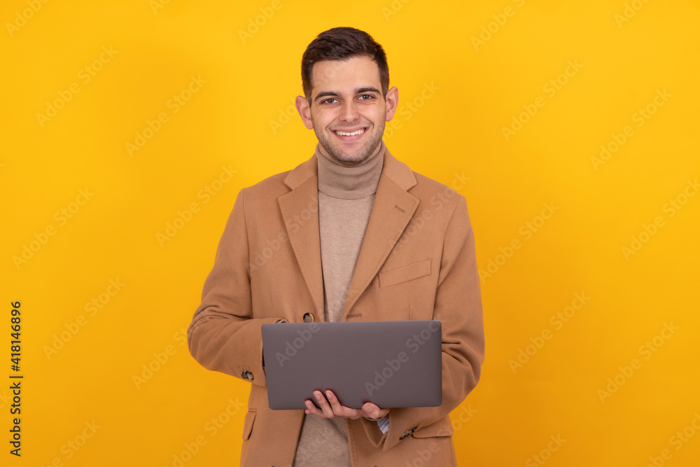 young man with laptop isolated on background young man with laptop isolated on background
