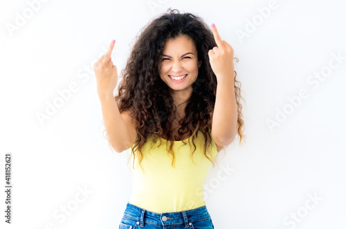 Gorgeous young girl showing middle fingers