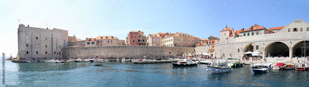Panoramic view of  Dubrovnik, Croatia. Turquoise waters of Adriatic Sea.  Entrance to Dubrovnik inner harbour