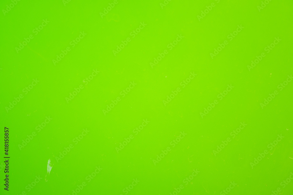 Green plastic material background, abstract texture. Green plastic material background, abstract texture.