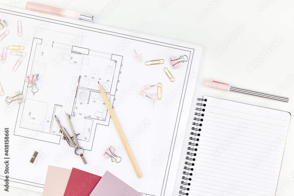 Interior designer table workplace with house plan Interior designer table workplace with house plan
