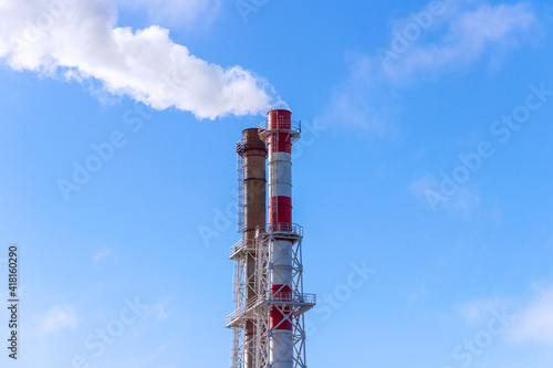Smoke coming from the chimney of a thermal power plant in St. Petersburg. The use of natural gas in the energy sector.