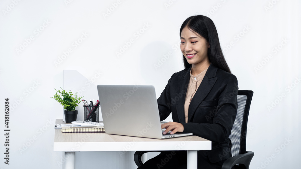 Young secretary woman checking her boss's meeting to typing email to her boss and clients Young secretary woman checking her boss's meeting to typing email to her boss and clients