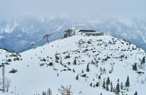 The snowfall over the Feuerkogel mount, Ebensee, Salzkammergut, Austria photo