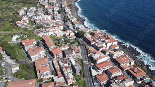 Drone flight view of Acitrezza bay in Sicily Italy