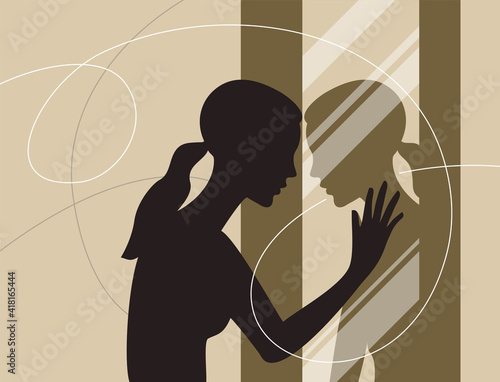 Self awareness - young woman looking at mirror