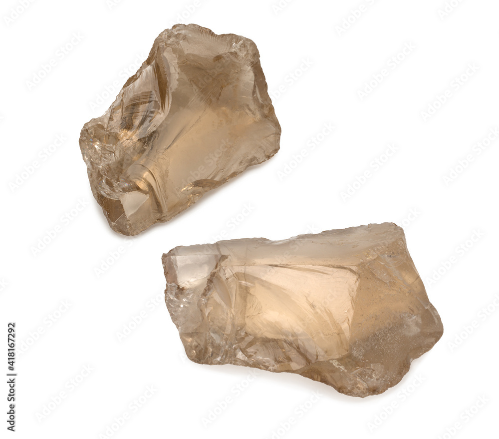 closeup of sample of natural mineral from geological collection - Rock crystal gem stones isolated on a white background