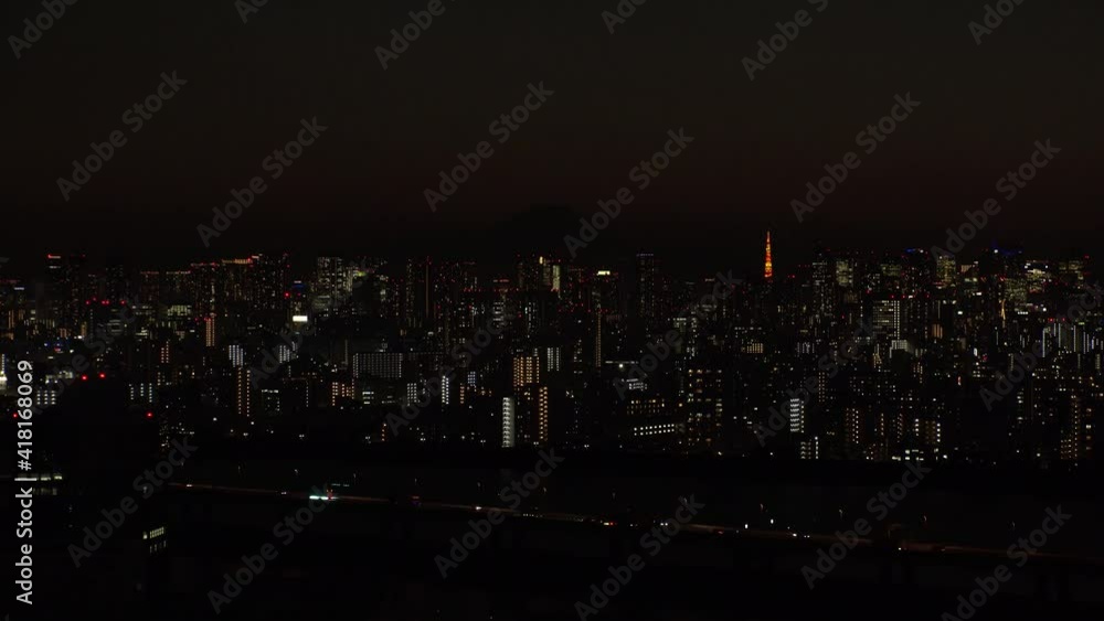 TOKYO, JAPAN : Aerial sunrise CITYSCAPE of TOKYO and MOUNT FUJI. Dawn sky, rising sun and buildings at downtown. Japanese metropolis and nature concept. Long time lapse zoom in video, night to morning TOKYO, JAPAN : Aerial sunrise CITYSCAPE of TOKYO and MOUNT FUJI. Dawn sky, rising sun and buildings at downtown. Japanese metropolis and nature concept. Long time lapse zoom in video, night to morning