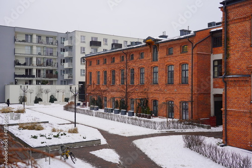 Architecture in Lodz. Housing estate and hotel . Mix of old and modern architecture. Winter day 