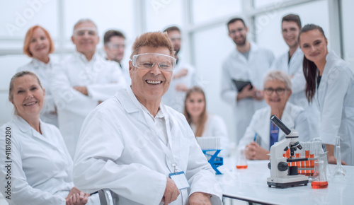 portrait of a successful supervisor and his team in the laboratory . © ASDF