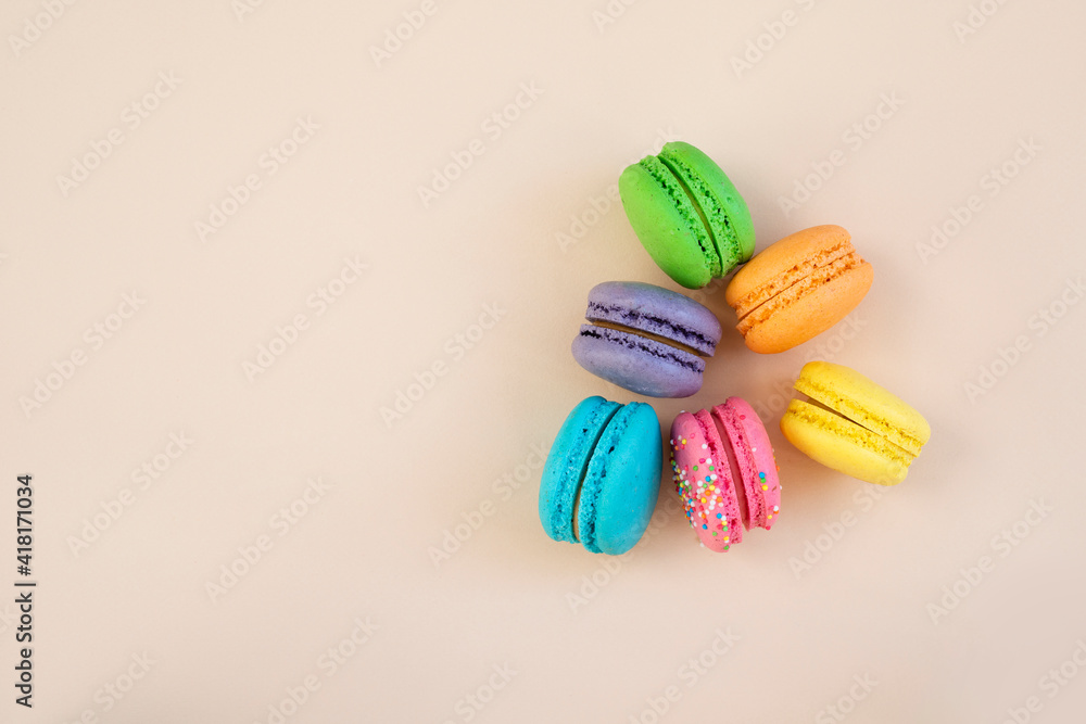 Tasty macarons on color background Tasty macarons on color background