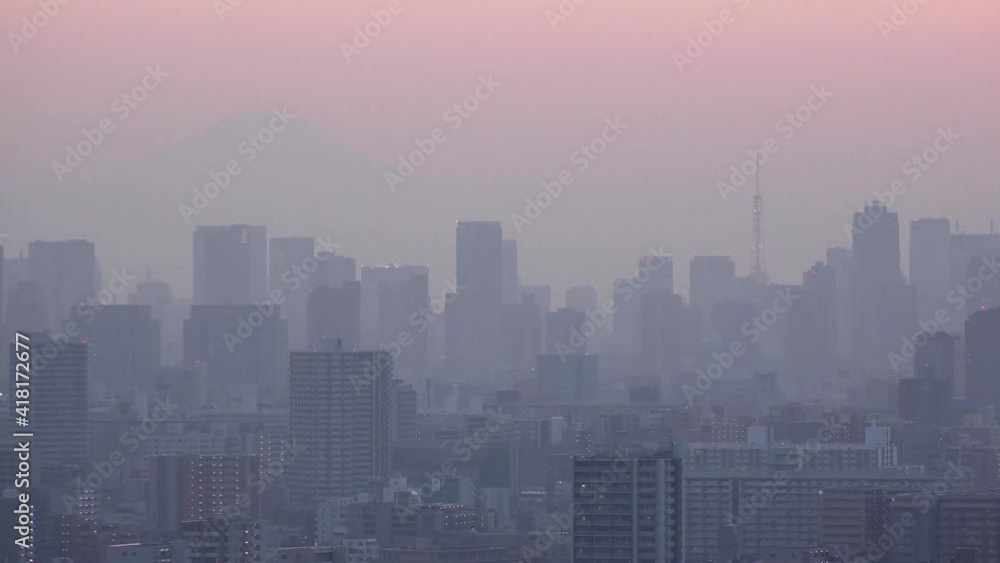 TOKYO, JAPAN : Aerial sunrise CITYSCAPE of TOKYO and MOUNT FUJI. Dawn sky, rising sun and buildings at downtown. Japanese metropolis and nature concept. Long time lapse zoom in video, night to morning TOKYO, JAPAN : Aerial sunrise CITYSCAPE of TOKYO and MOUNT FUJI. Dawn sky, rising sun and buildings at downtown. Japanese metropolis and nature concept. Long time lapse zoom in video, night to morning