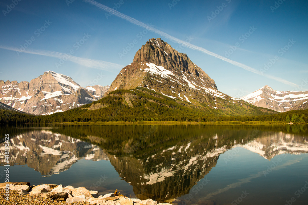 Reflection in lake in Montana’s Glacier National Park USA
