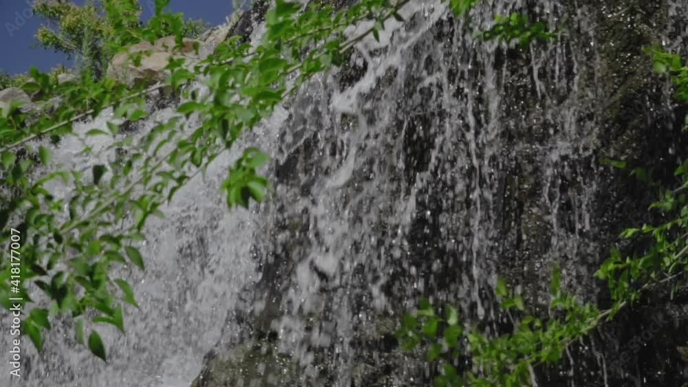Slow Motion Falling on The Stones Water from the Mountain River Slow Motion Falling on The Stones Water from the Mountain River