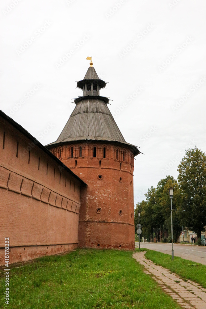 red brick wall and tower of Saviour Monastery of St. Euthymius in Suzdal, Russia