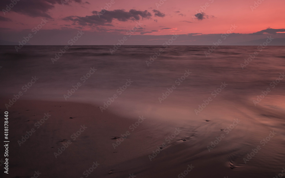 Pink fantastic landscape similar to Mars in a late quiet evening