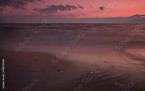 Pink fantastic landscape similar to Mars in a late quiet evening