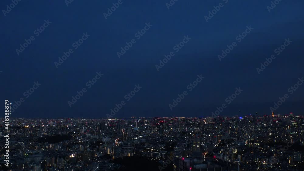 TOKYO, JAPAN : Aerial sunrise CITYSCAPE of TOKYO. View of dawn sky and buildings at downtown area. Japanese city life and urban metropolis concept. Long time lapse zoom out video, night to morning. TOKYO, JAPAN : Aerial sunrise CITYSCAPE of TOKYO. View of dawn sky and buildings at downtown area. Japanese city life and urban metropolis concept. Long time lapse zoom out video, night to morning.
