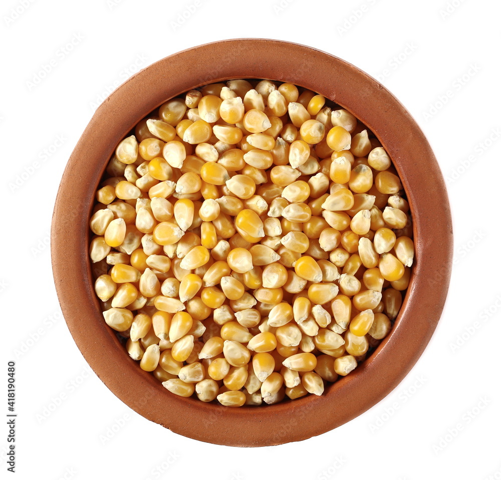 Yellow raw grain corn for popcorn in clay pot isolated on white, top view Yellow raw grain corn for popcorn in clay pot isolated on white, top view