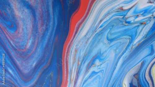 Liquid abstractions. Deep ink spaces. Moving abstract colorful background. Mixing paint colors.