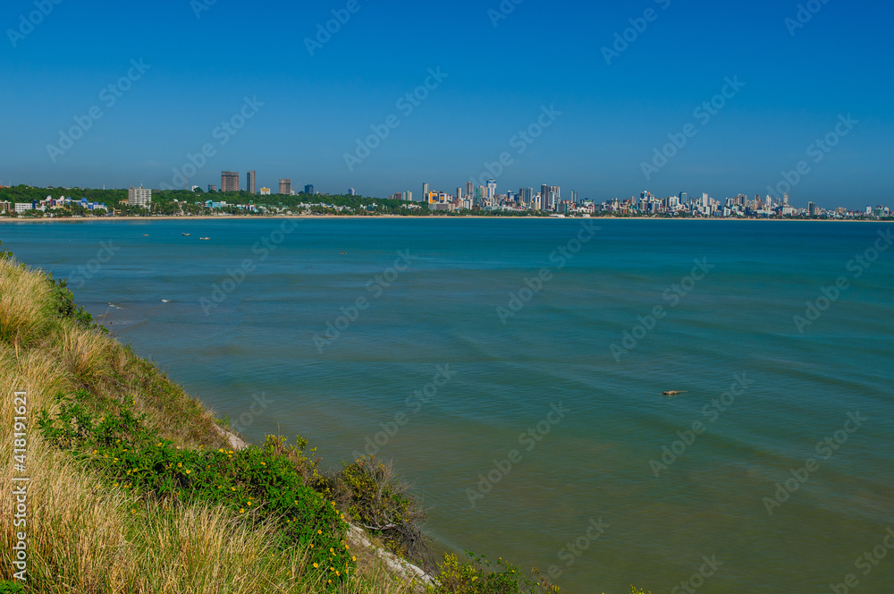 Joao Pessoa, State of Paraiba, Brazil on February 17, 2009. Partial view of the city showing buildings and the sea.