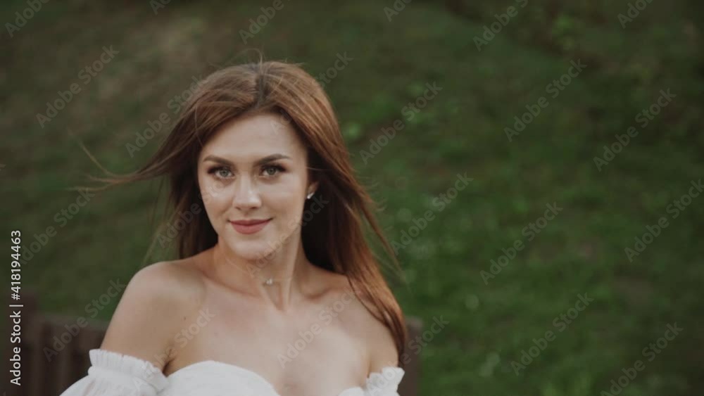 Bride and groom embracing in wedding day.Lovely newlyweds hugging and kissing Bride and groom embracing in wedding day.Lovely newlyweds hugging and kissing