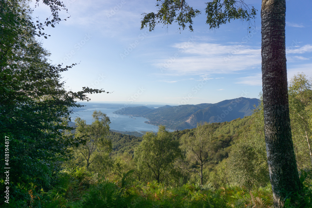 Lake maggiore and lake mergozzo seen from the mountains of val d'ossola during a summer day, near the town of Mergozzo, italy - September 2020.