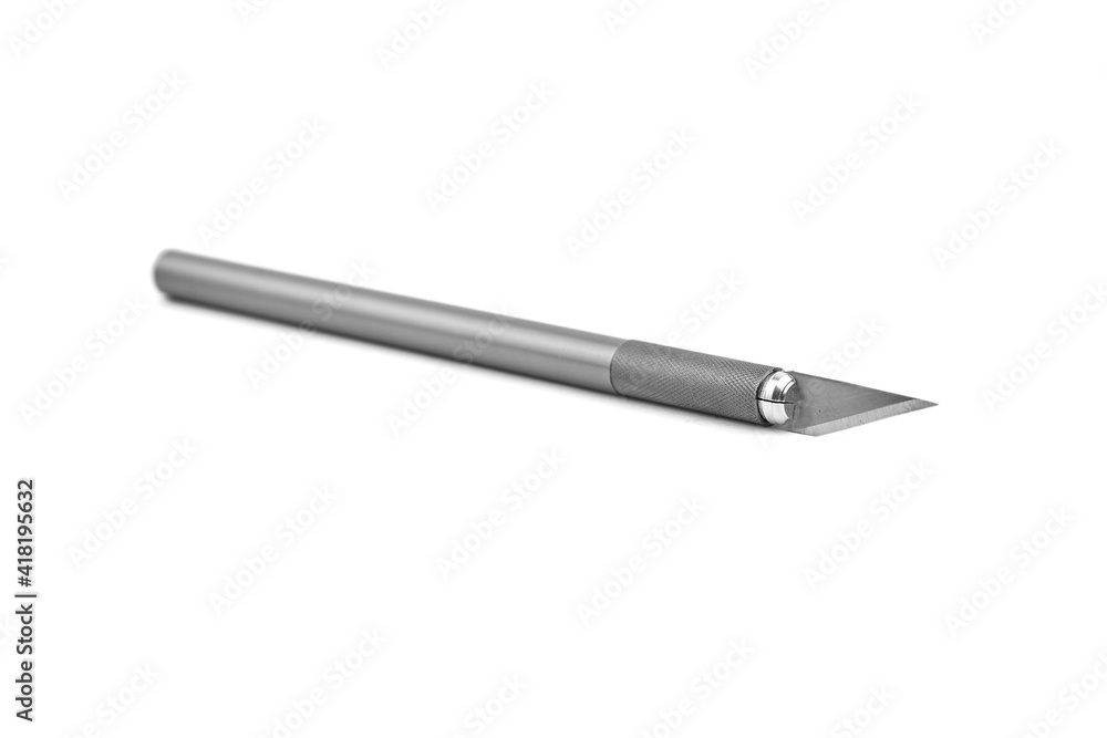 Craft knife isolated on white background. Paper knife cutter Craft knife isolated on white background. Paper knife cutter