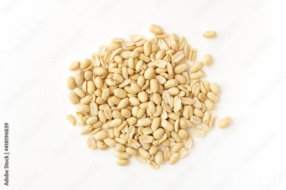 Arranged peanuts peeled and isolated on white background. Arranged peanuts peeled and isolated on white background.