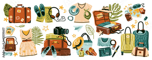 Travel stuff. Set of various luggage bags, suitcases, cosmetics, clothes. Vacation, holiday. Collection of items for vacation or journey decorated by tropical leaves, shells and flowers isolated. 