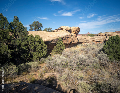 Surreal Canyonlands National Park sandstone domes and ice blue sky