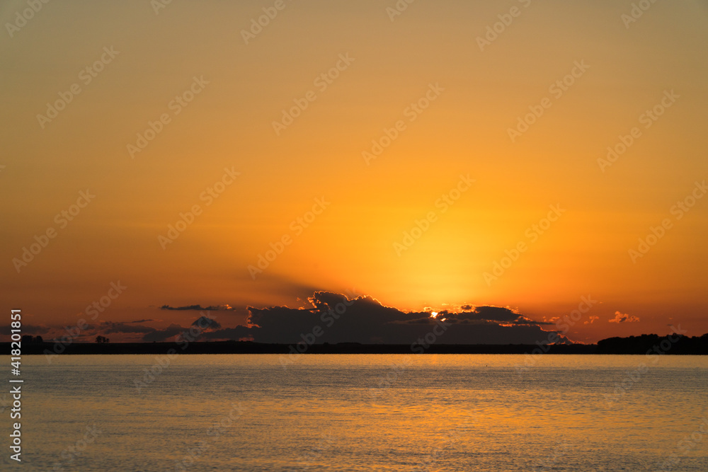 Fototapeta premium sunset uruguai river colorful clouds