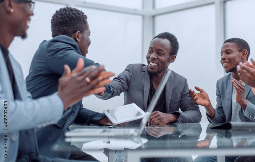 business people greeting each other during a working meeting. business people greeting each other during a working meeting.