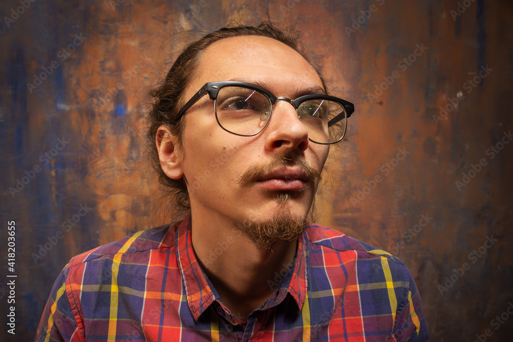 Obraz premium Artistic studio male portrait in color