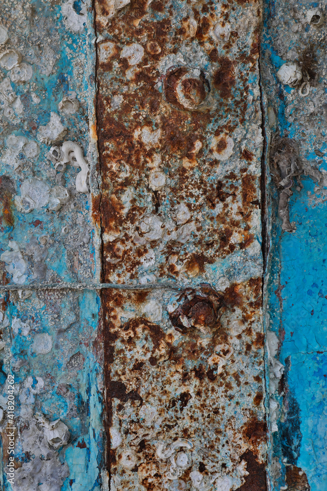 Old wooden fishing boat out of water, detail of paint. Crescent City, California. Old wooden fishing boat out of water, detail of paint. Crescent City, California.