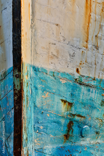 Old wooden fishing boat out of water, detail of paint. Crescent City, California. © Danita Delimont