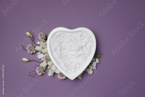 Newborn baby photography heart with flowers . Background for newborn baby.