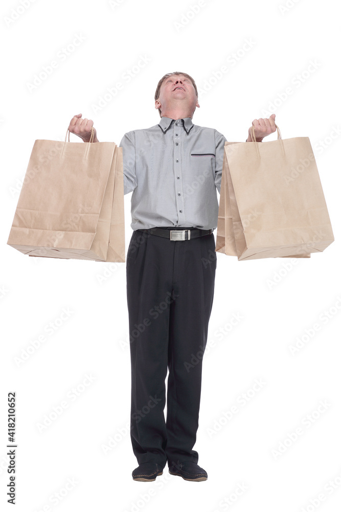 senior man with shopping bags . isolated on a white background. senior man with shopping bags . isolated on a white background.