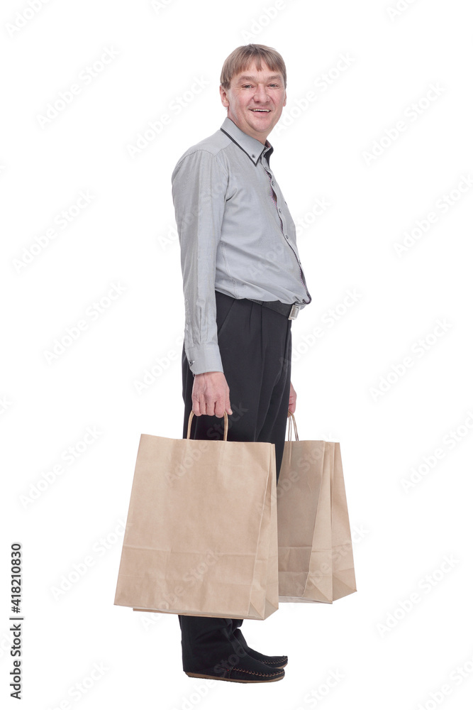happy man with shopping bags looking at you. happy man with shopping bags looking at you.
