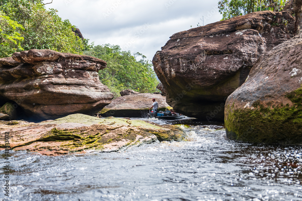 Canaima National Park, Venezuela, 02.13.2021: canoe excursion to go to highest Salto Angel waterfall in the world. Canaima National Park, Venezuela, 02.13.2021: canoe excursion to go to highest Salto Angel waterfall in the world.