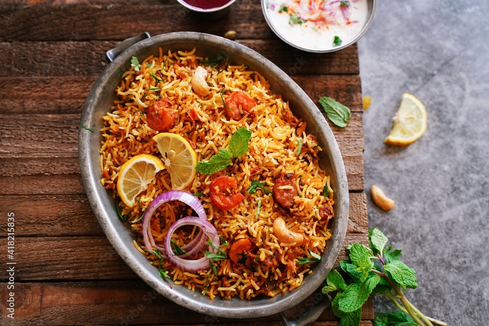 Homemade Prawn Shrimp biryani served with Yogurt Raita and beet pickle Homemade Prawn Shrimp biryani served with Yogurt Raita and beet pickle