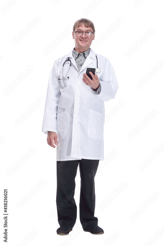 attending doctor is looking at the screen of his smartphone. attending doctor is looking at the screen of his smartphone.