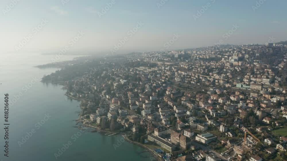 Stunning aerial of beautiful coastal city. Shot in Pully, Switzerland Stunning aerial of beautiful coastal city. Shot in Pully, Switzerland