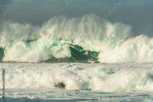 Huge winter waves crashing in Carmel Bay  California.