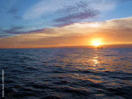 Sun rises over Alegranza island  Canary Islands  Spain.
