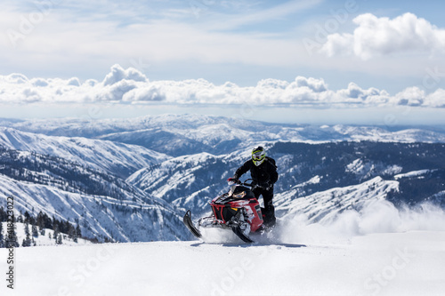 Snowmobiling on mountain