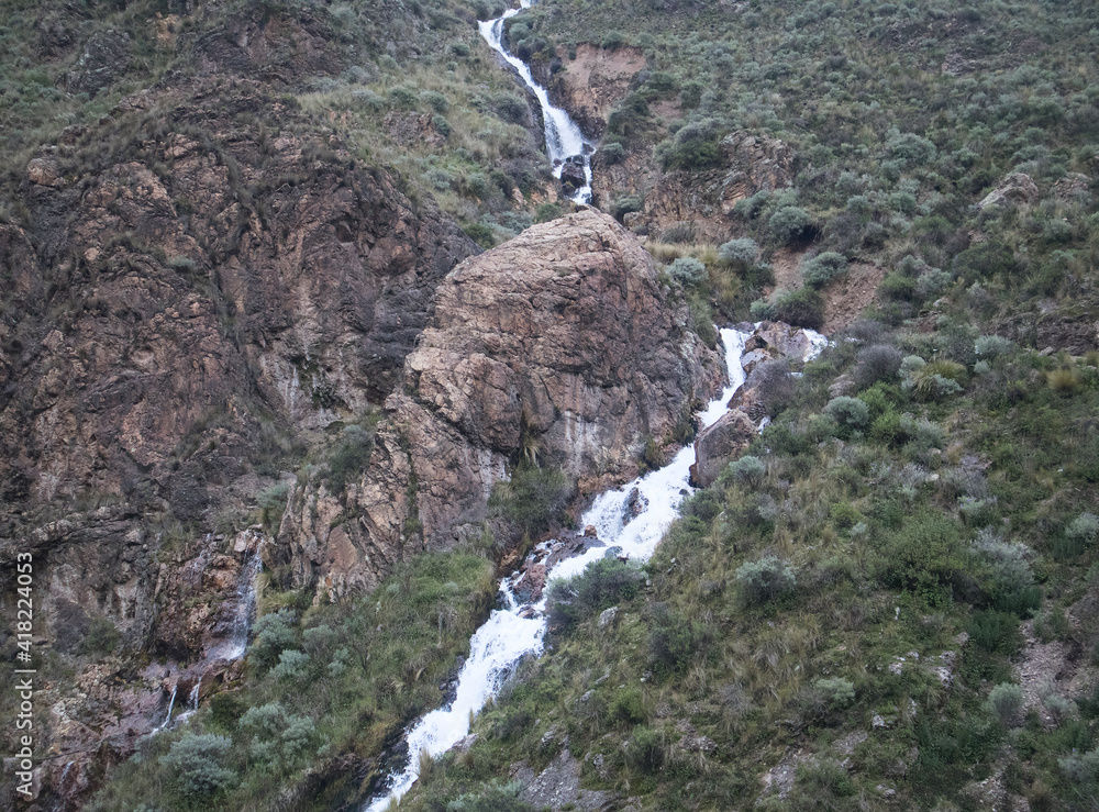 waterfall in the mountains light waterfall in the mountains light
