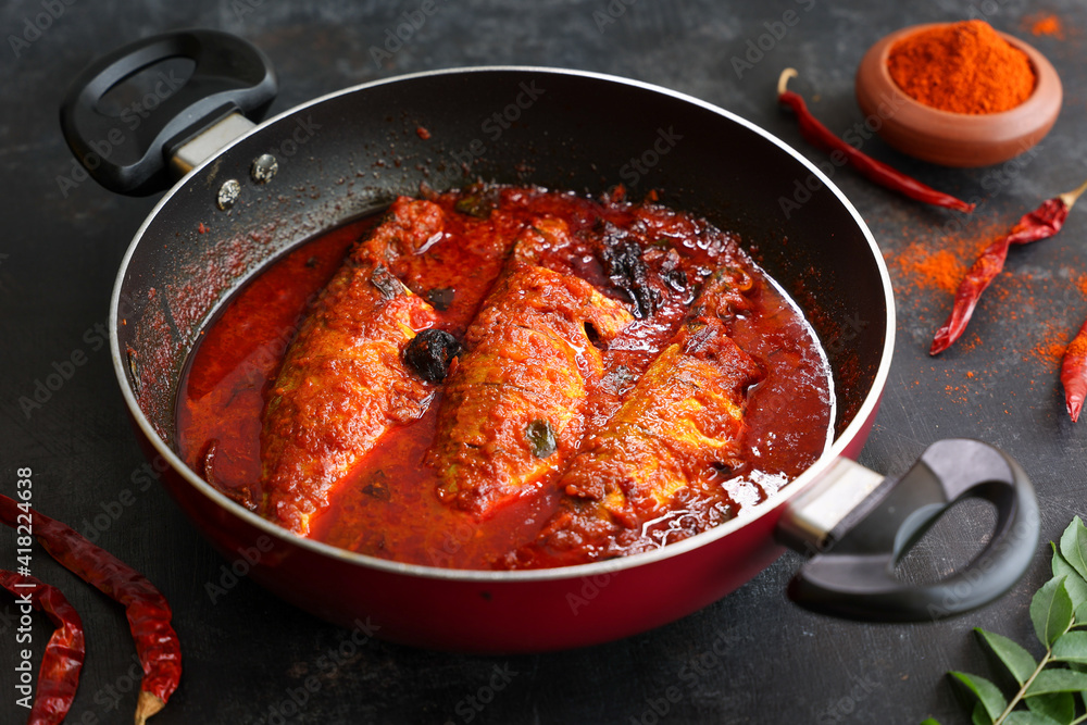 Spicy Mackerel fish curry gravy , cooking spicy Kerala fish curry , Goan red fish curry , Indian fish curry Bengali fish masala curry Kolkata, India Sri Lanka. Lankan food Spicy Mackerel fish curry gravy , cooking spicy Kerala fish curry , Goan red fish curry , Indian fish curry Bengali fish masala curry Kolkata, India Sri Lanka. Lankan food