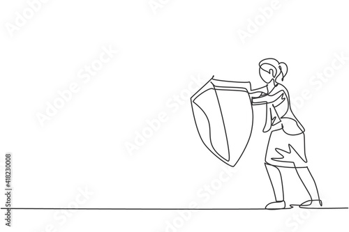 Single continuous line drawing of young female manager holding metal shield protection. Defense businesswoman metaphor. Minimalism concept dynamic one line draw graphic design vector illustration