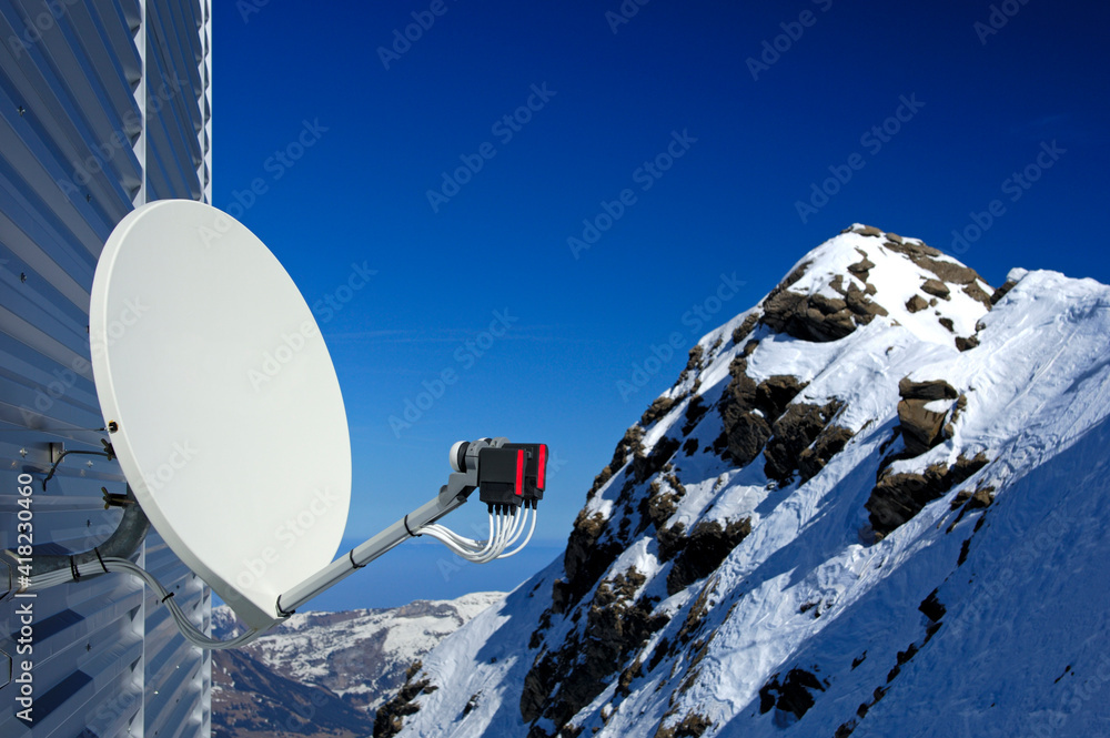 Φωτογραφία Parabolic Antenna At A Building In The High Mountains, Swiss Alps, Switzerland